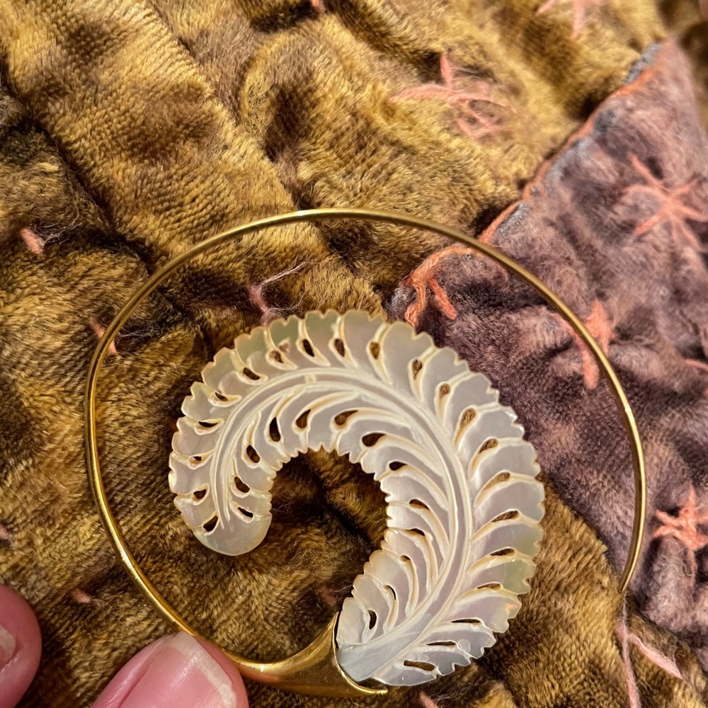 Mother of Pearl and solid gold horn single earring designed in San Francisco